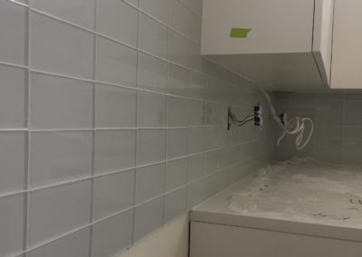 sustainable design build denver colorado west colfax 1220 perry during construction custom cabinet backsplash tile quartz