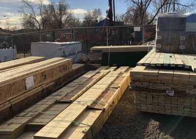 sustainable design build denver colorado west colfax 1374 yates during construction lumber beam framing