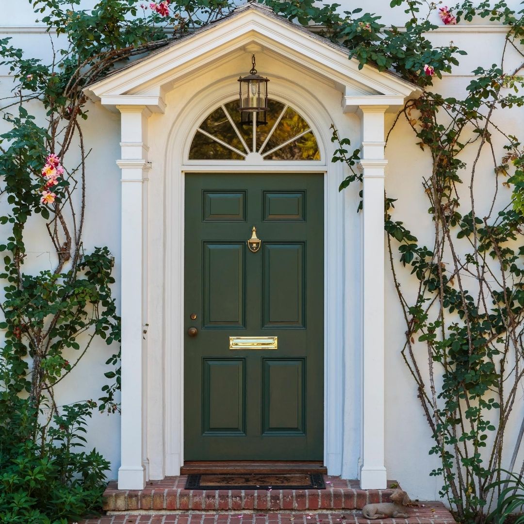 front door entryway green vines white old colonial gold plate window beautiful home goals 