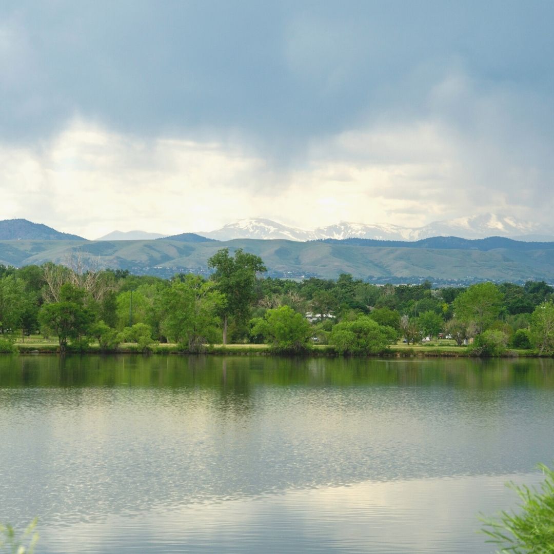 Sloans Lake denver mountain green trees clouds adu