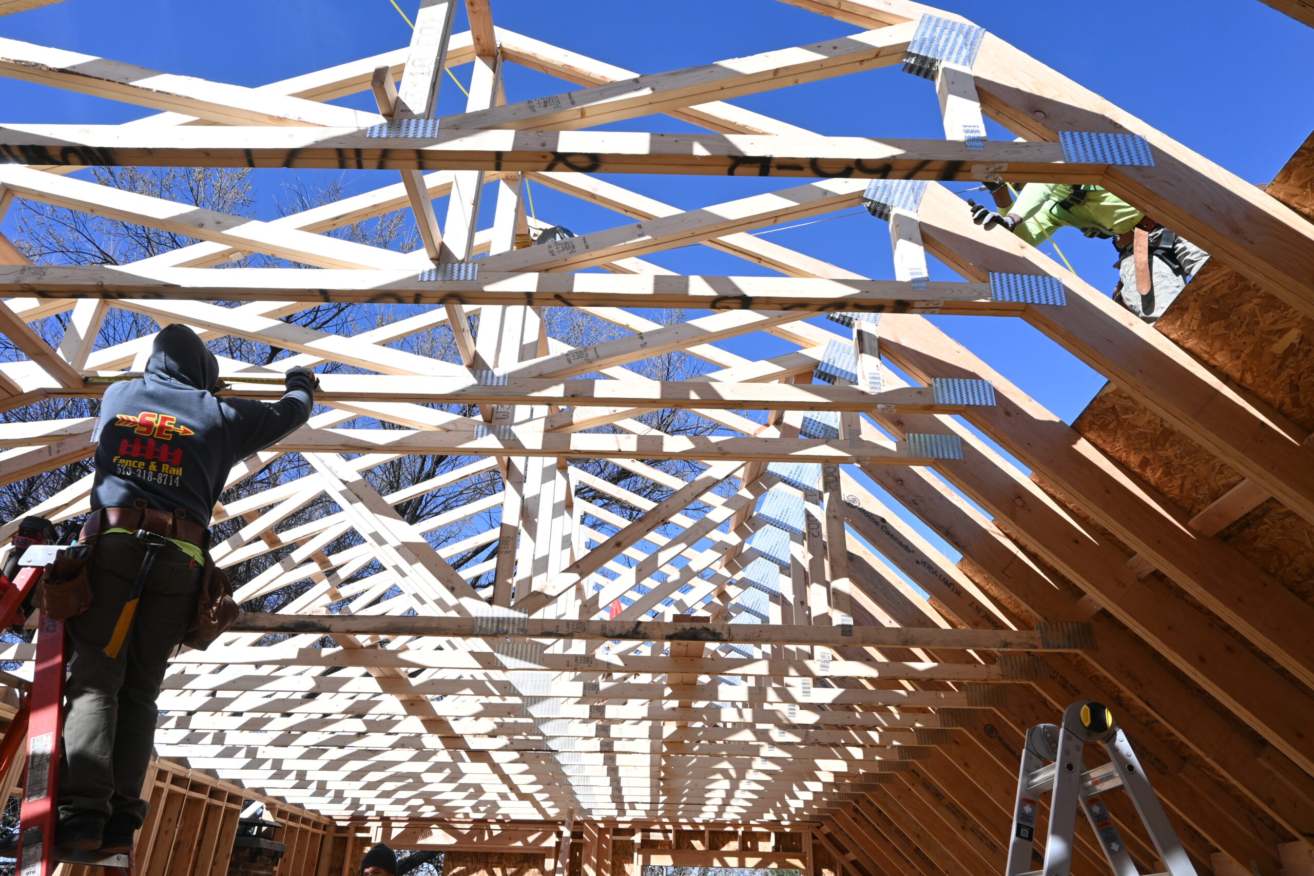 Sustainable Design Build custom home builder addition roof truss framing