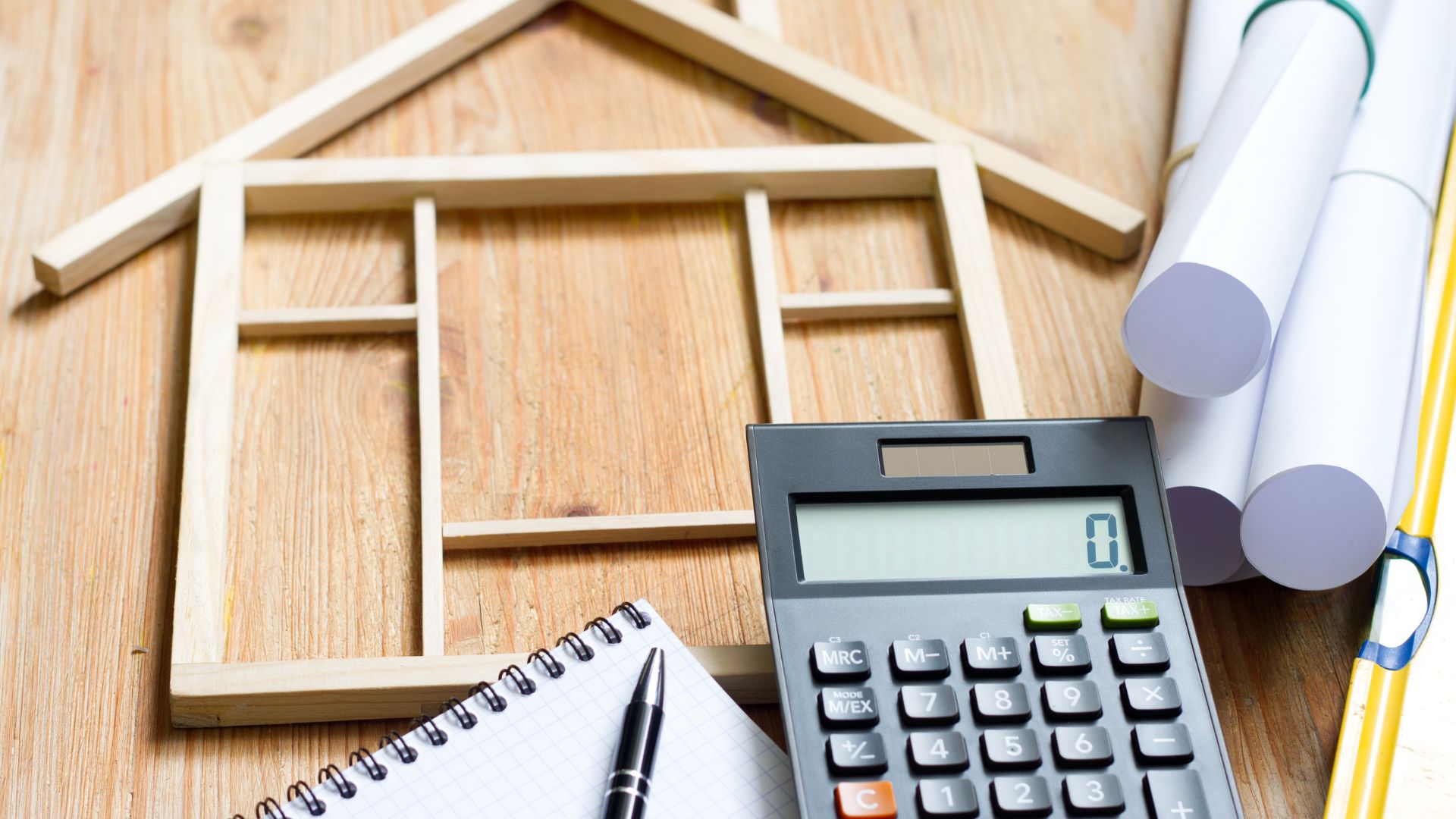 deciding on a home remodel or moving calculator home costs plans to home remodeling pen and paper