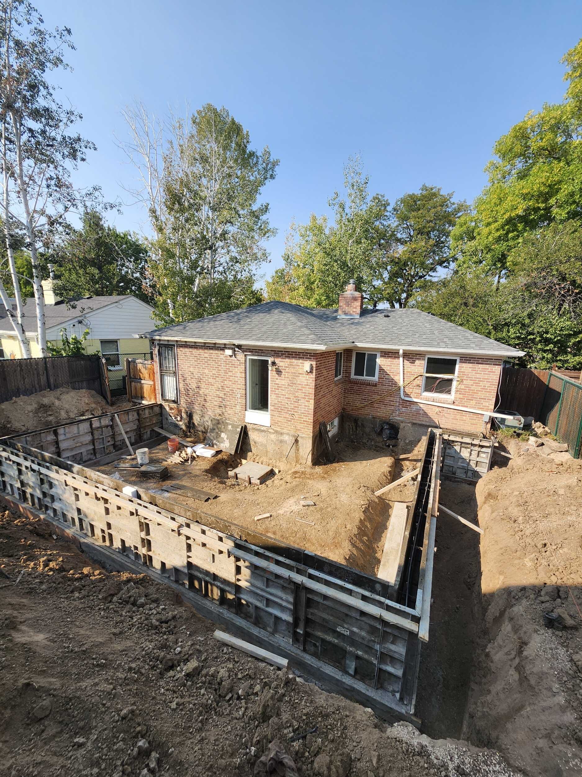 Montclair Home Addition Denver Concrete Foundation Install General Contractor Home Builder Custom Remodel Renovation Backyard
