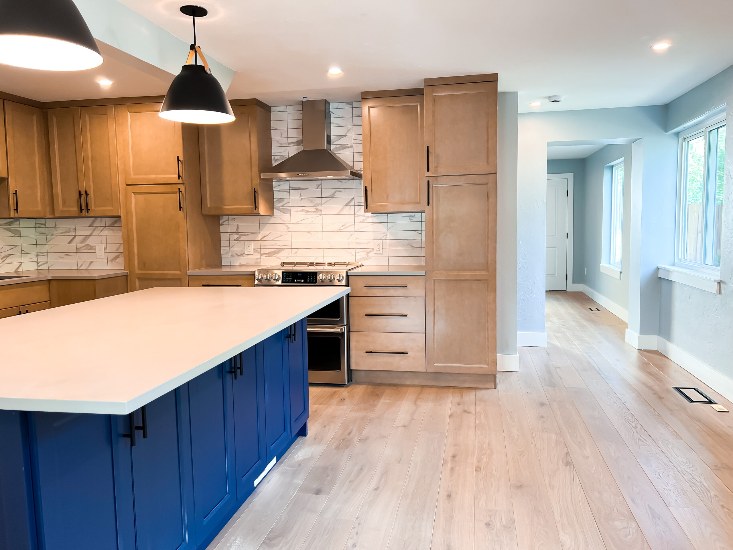 Montclair Home Addition Home remodel kitchen custom cabinet kitchen isalnd blue custom painted cabinets home remodel
