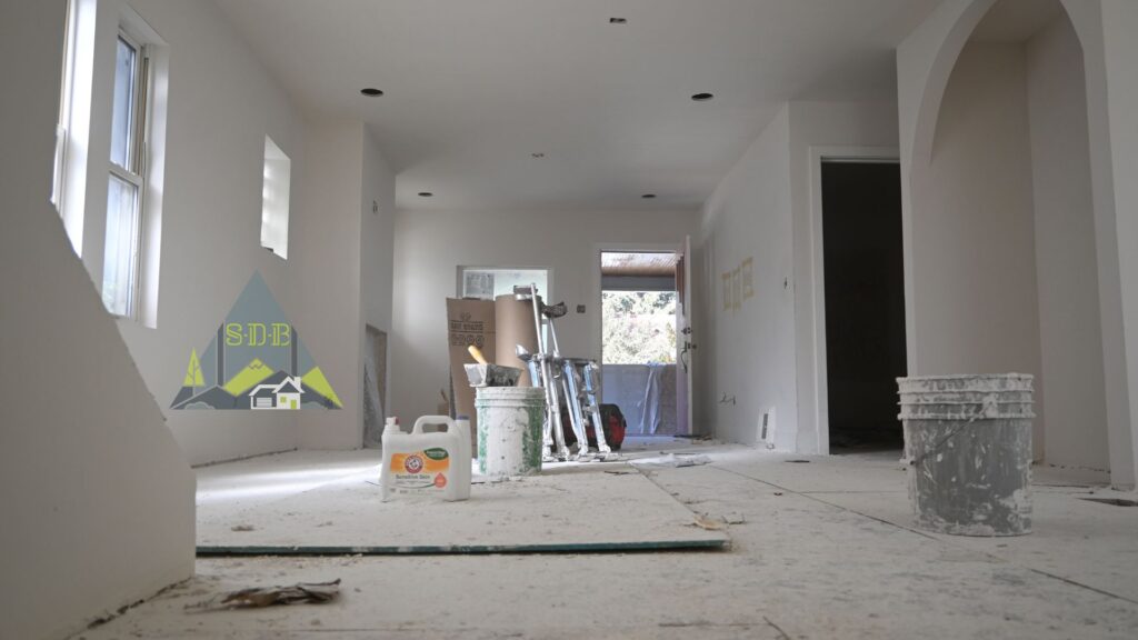unfinished home remodel drywall stairs windows