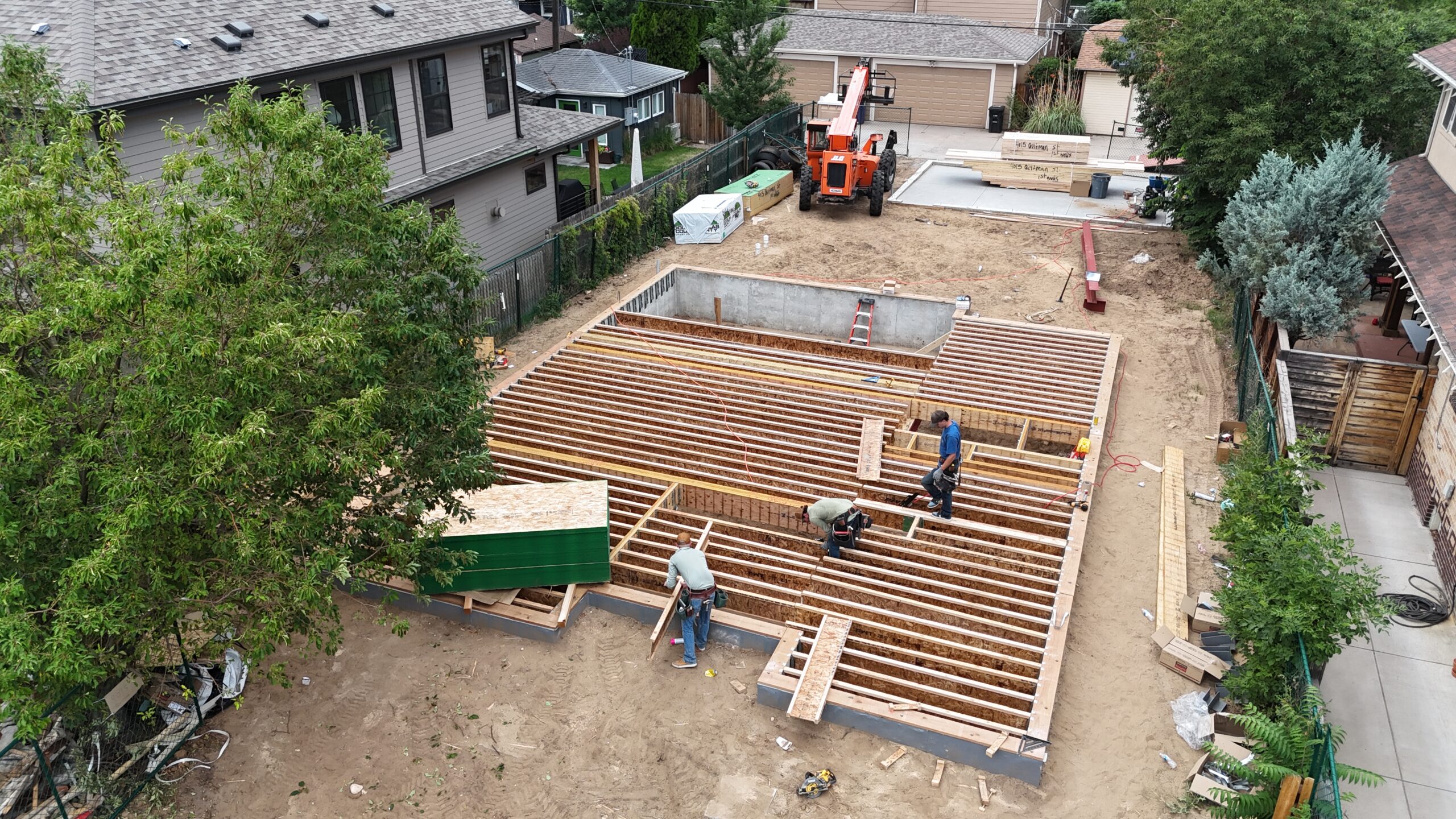 Sustainable Design Build Residential Construction Overhead at beginning of construction of custom home