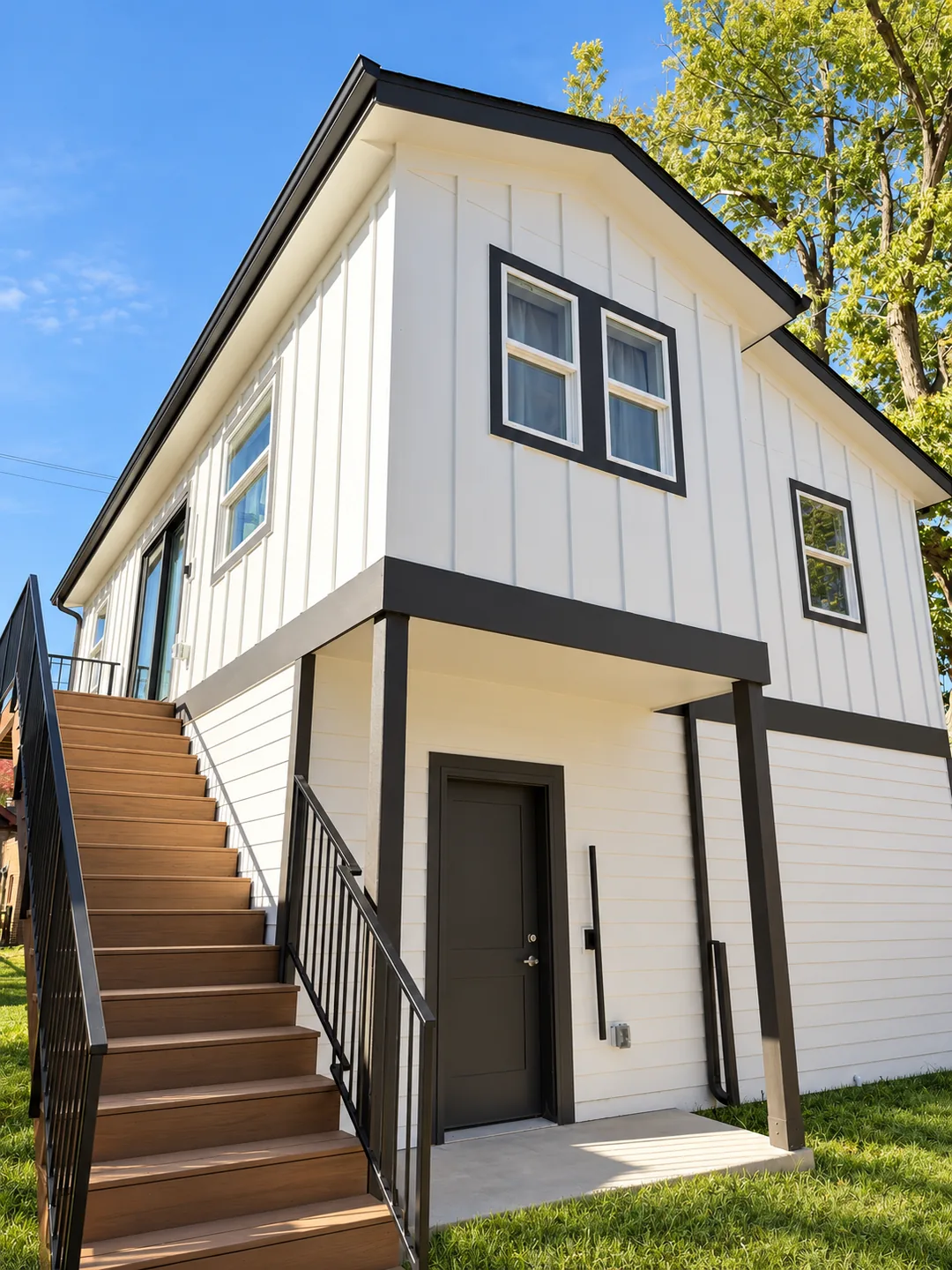 Denver ADU Bright Warm Exterior with green grass and blue skies